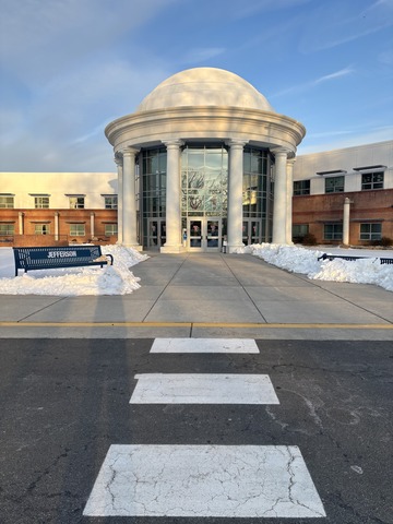 An image of our sidewalk leading into the dome completely cleared of snow and ice by TJ's custodians.