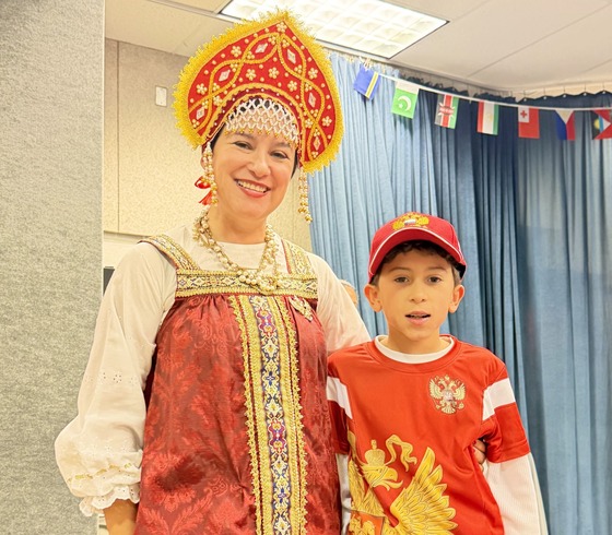 Parent and 4th grader in Russia attire