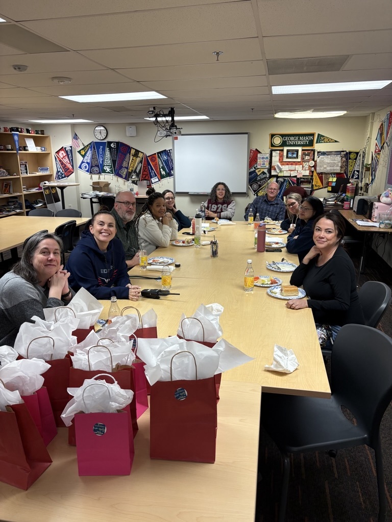 adults sitting at a table