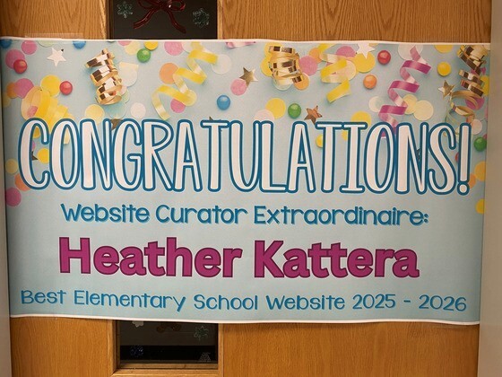 Sign Celebrating Forestville ES's Ms. Kattera's as best ES website