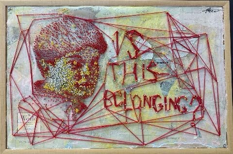 Art piece by McLean High School student depicting head in string