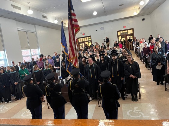 Mountain View HS Graduation view of crowd from stage with JROTC color guard