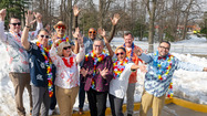 Dr. Reid and staff outside dressed in Hawaiian shirts