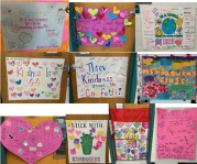 posters hanging with different words relating to kindness