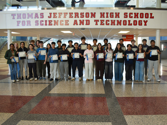 Some of the award winners posing in Nobel Commons with their certificates