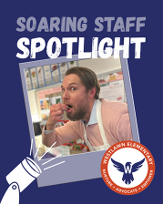 Soaring Staff Spotlight: Mr. Hill prepares to eat a bite of food prepared by the second grade chefs in Ms. Roundtree's room
