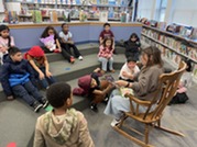 Mrs. Winer getting students excited for the book fair.