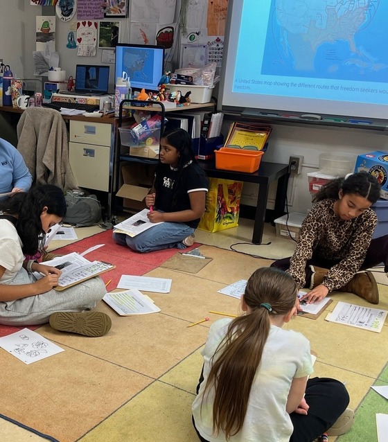 Fourth graders working