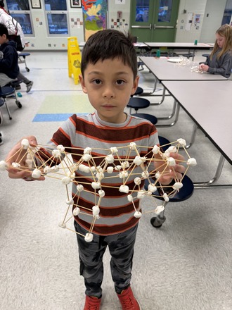 Student shows creation during clubs 