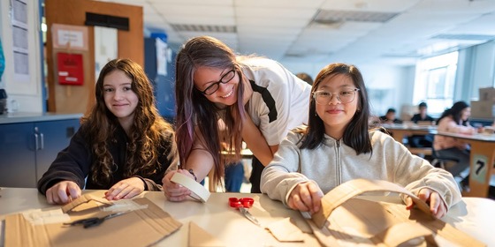 students smiling at lunch