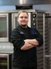 Sean Appleby, a culinary instructor named the 2026 ACTE New Teacher of the Year.