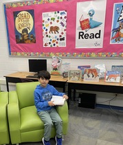 Student reading in the library