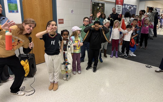Students lined up for the start of the Parade of Nations