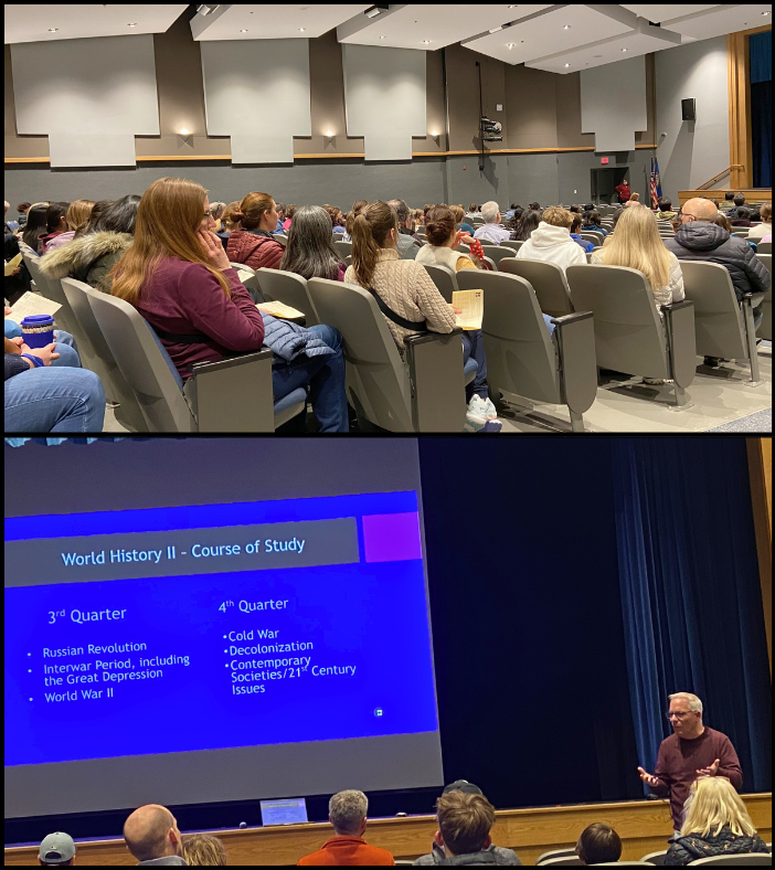 Families watching a powerpoint presentation at orientation for new freshmen students