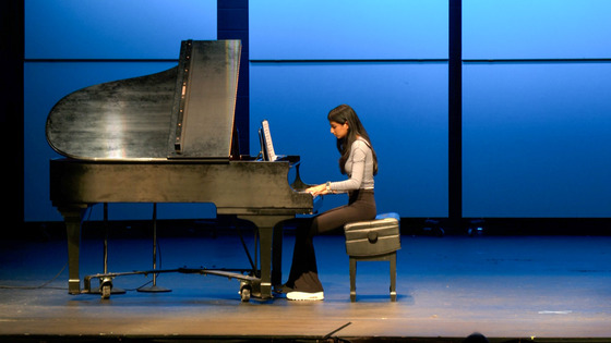 TJ Student at piano during TJ's Got Talent contest