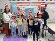 Mrs. Jefferson's class wearing cat in the hat costumes.