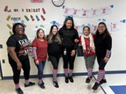 Kinder teachers wearing red and blue