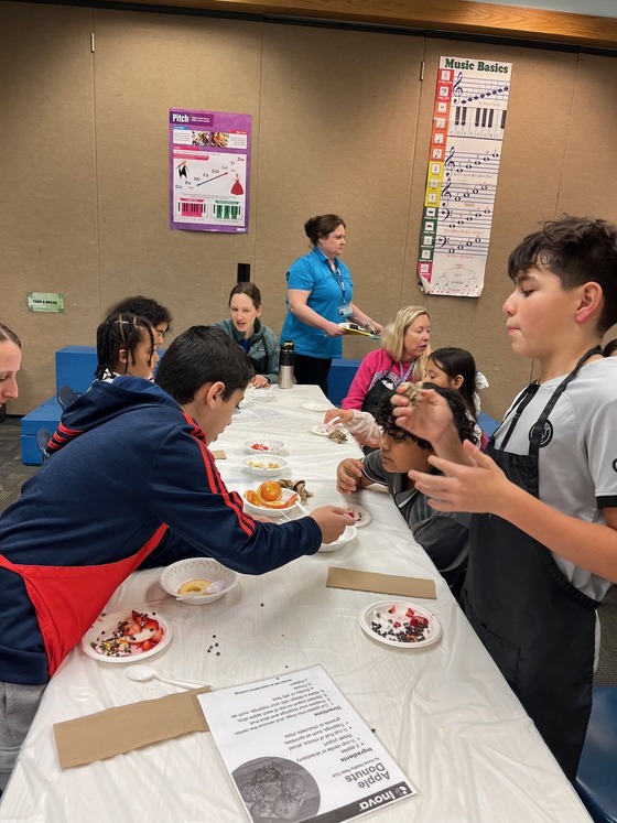 Mentees making Apple Donuts
