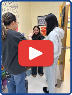 Two students in a classroom perform a secret handshake with a peer, overlayed by a large red play button.