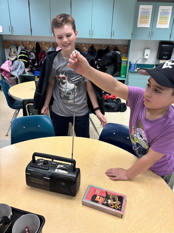3rd Graders exploring a boom box antenna