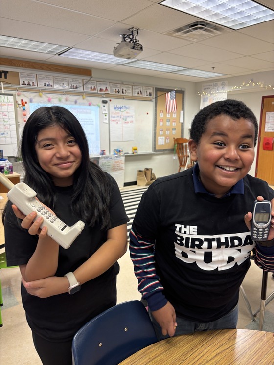 3rd graders excited about old phones