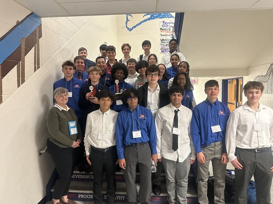 students standing in a staircase