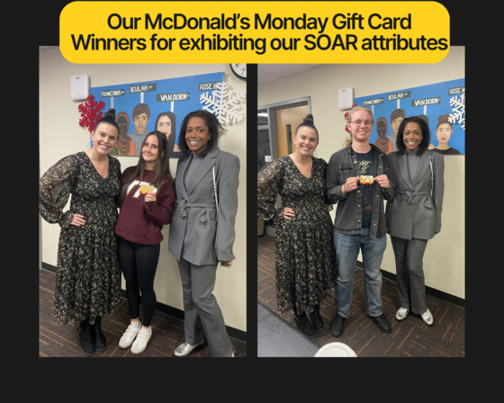 student and staff standing in main office