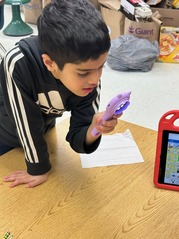 Student with magnifying glass