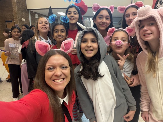 Students and teacher lined up for book character day parade