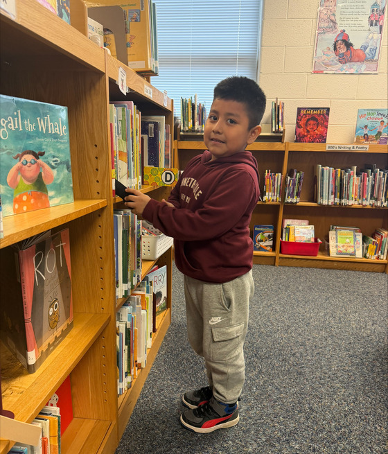 Kinder Student at the Library
