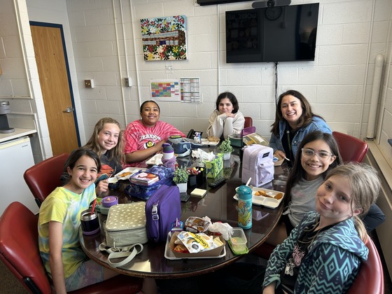 principal having lunch with 6 girls.  Read the text section below under "Listening to students" for more info.