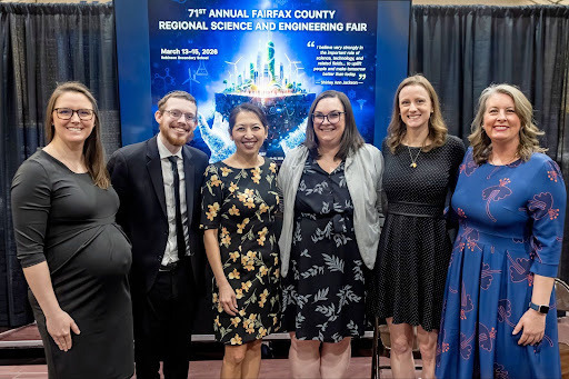Science Fair team smile for a photo