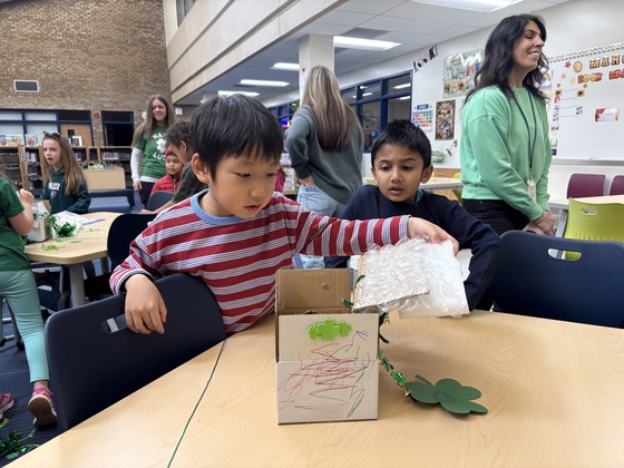 Kindergarteners making leprechaun traps