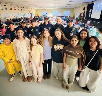 Money Jar members with Firefighters