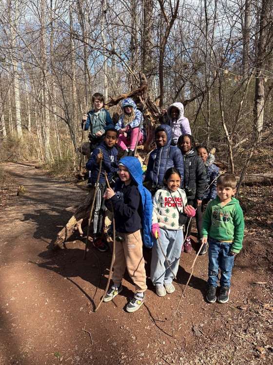 outdoor club in front of the stick fort