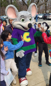 Chuck E. Cheese stopped by to greet students and build excitement for the upcoming PTA fundraiser.