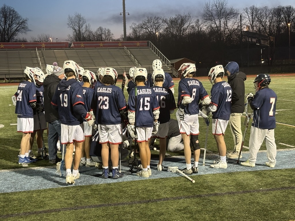 students on lacrosse field