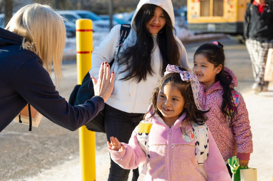 Principal with Students at Arrival