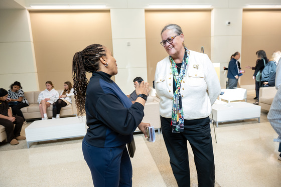 Dr. Reid speaks to a community member