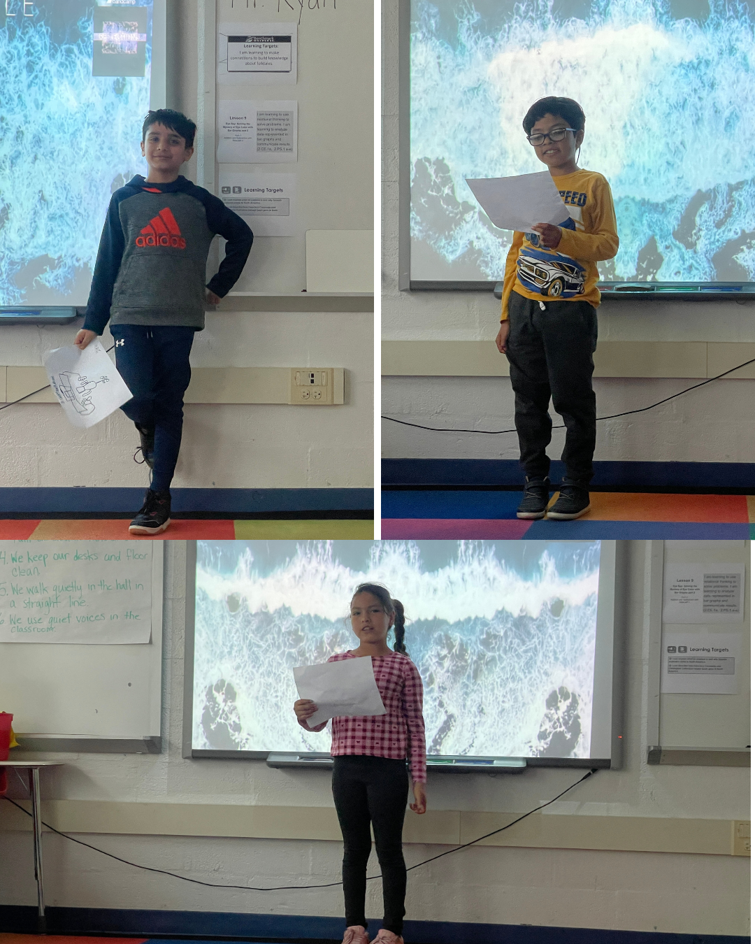 Grade 2 students presenting their work while their classmates listen. 