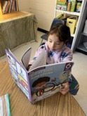 Student reading a book