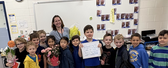 picture of teacher with students