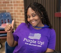  girl with Purple Up t-shirt