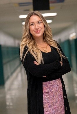 Woman standing with arms crossed