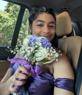 A person holding a bouquet of flowers