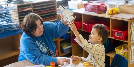 teacher playing with student