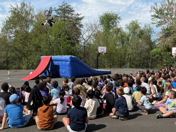 Picture of a bicyclist doing a stunt