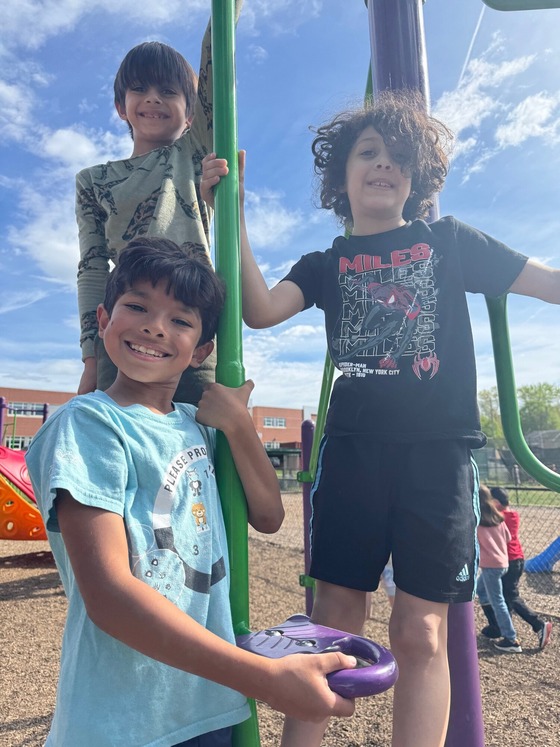 Three students on the playground