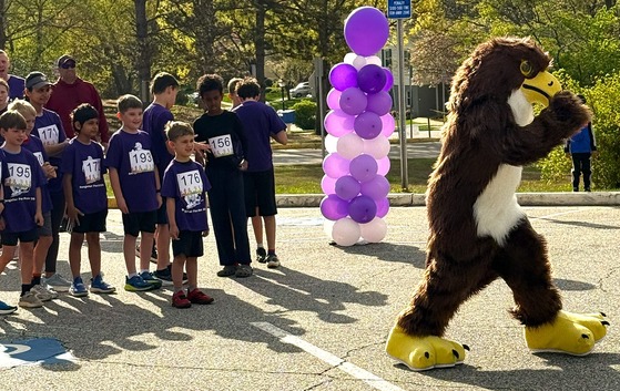 Sangster's Military Fun Run Lead by the Falcon!