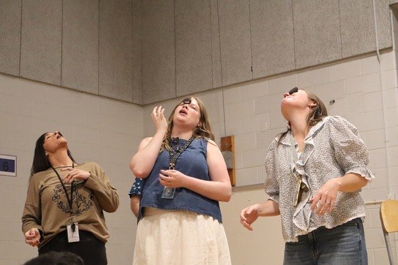 Kindergarten Teachers Flynn, Olson, and Wideman playing the Cookie Face Challenge